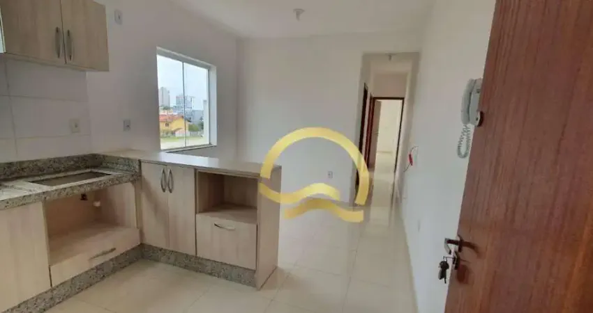 Apartamento com 2 dormitórios para alugar, 61 m² por R$ 2.925,00/ano - Centro - Balneário Piçarras/SC