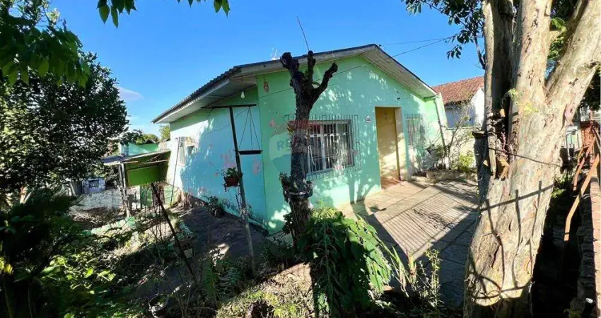 Terreno com casa de esquina, 02 dormitórios, metragem 11m X 37,5M² - Igara - Canoas