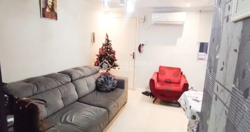 Oportunidade no bairro igara apartamento 2 dormitórios condomínio perto de tudo.