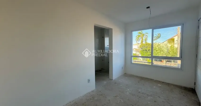 Apartamento 2 dormitórios no niterói próximo a br116 e ótima posição solar