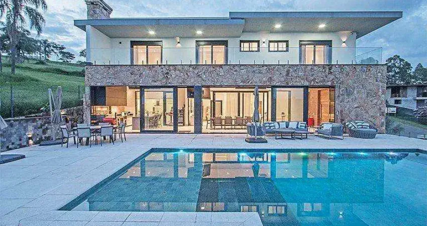 Casa de alto padrão mobiliada no condomínio fazenda dona carolina – itatiba/sp – 7 suítes, piscina aquecida e vista privilegiada