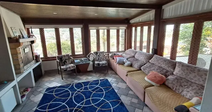 Casa em condomínio fechado com 3 quartos à venda na Rua Erechim, 100, Nonoai, Porto Alegre