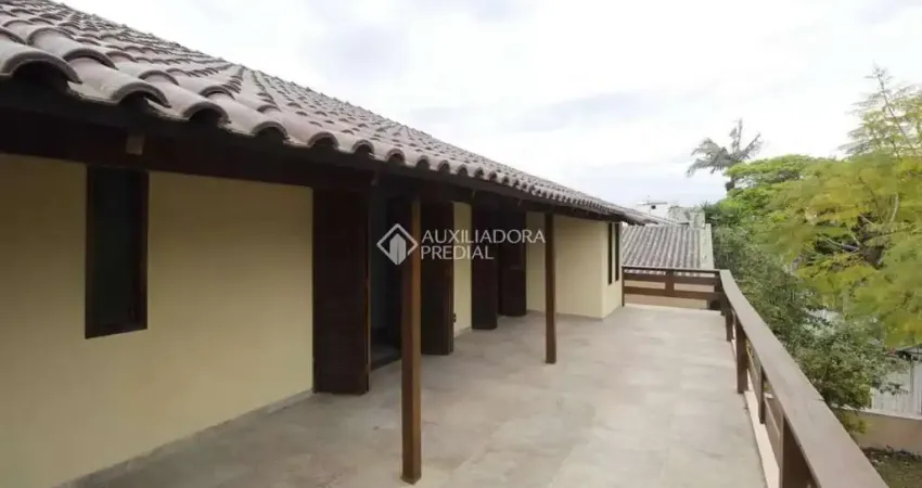 Casa com 4 quartos à venda na Rua Dom Jaime de Barros Câmara, 325, Sarandi, Porto Alegre