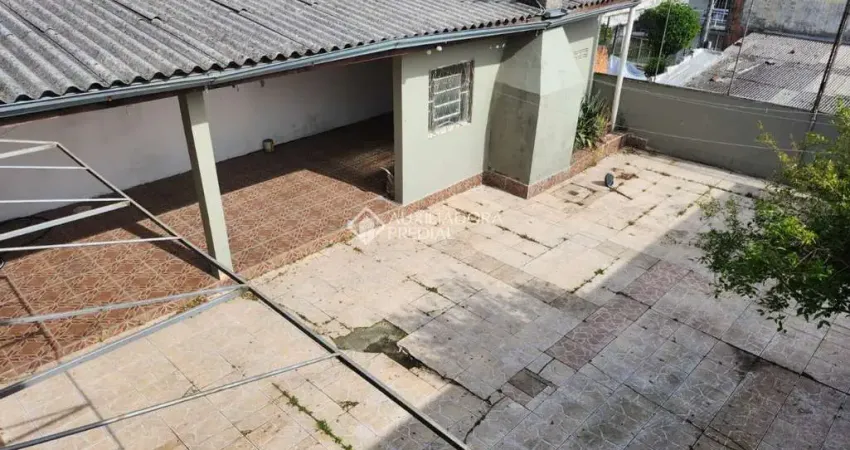 Casa com 4 quartos à venda na Rua João do Rio, 405, Partenon, Porto Alegre