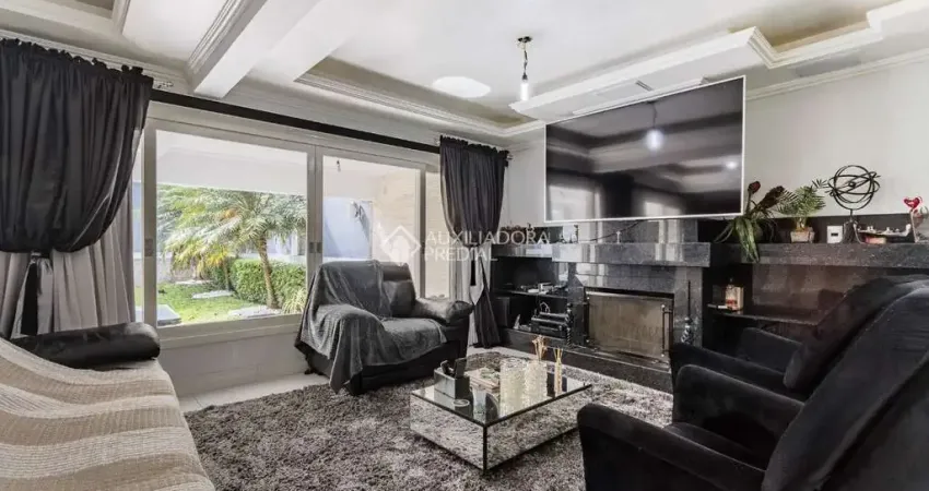 Casa com 4 quartos à venda na Avenida General Barreto Viana, 195, Chácara das Pedras, Porto Alegre