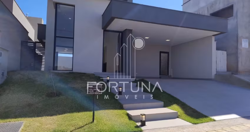 Casa moderna em condomínio fechado com piscina aquecida e área para churrasco