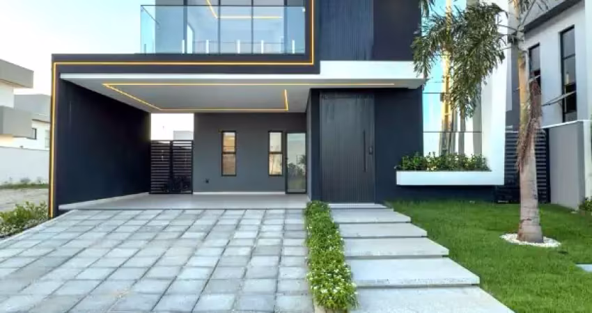 Casa duplex com 4 suítes, ambientes amplos e uma área de lazer acolhedora, no alphaville terras 4