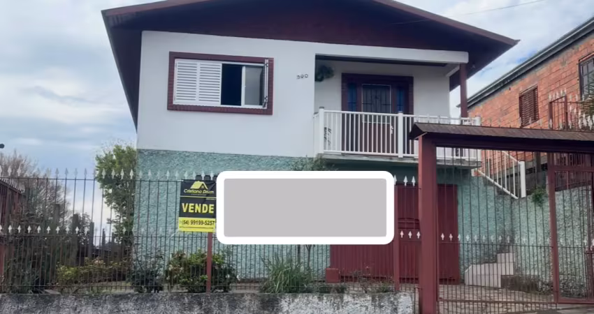 Excelente casa de alvenaria com 02 moradias muito bem localizada bairro serrano!
