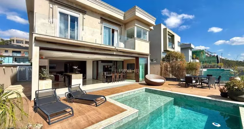 Casa de luxo mobiliada com 4 suítes, piscina aquecida e vista para a mata em condomínio exclusivo