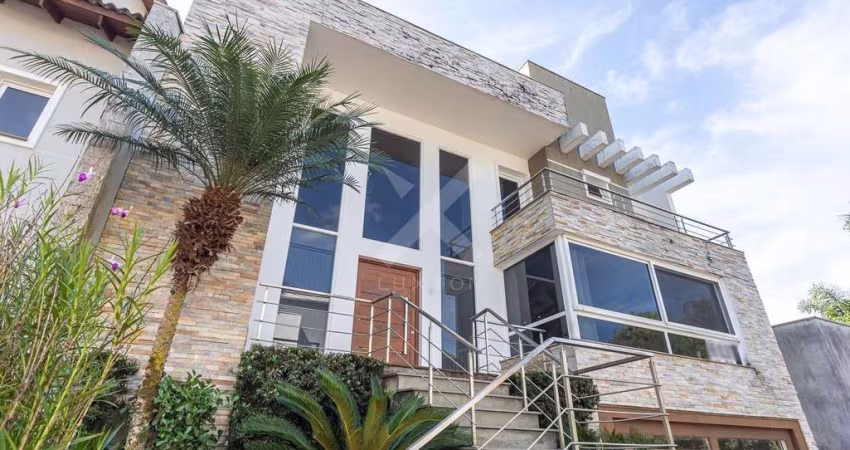 Casa em condomínio fechado com 4 quartos à venda na Rua Tocantins, 540, Agronomia, Porto Alegre