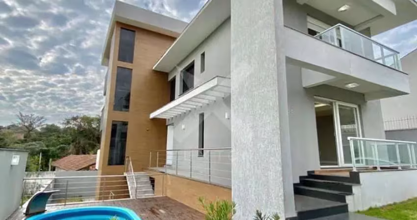Casa com 4 quartos para alugar na Rua Claudio da Silva Pinto, 658, Guarujá, Porto Alegre