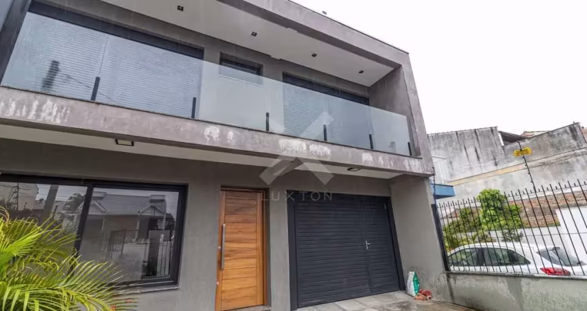 Casa com 3 quartos para alugar na Rua Buarque de Macedo, 931, São Geraldo, Porto Alegre