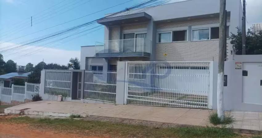 Casa de alto padrão á venda com 4 suites no bairro centenário em torres/rs