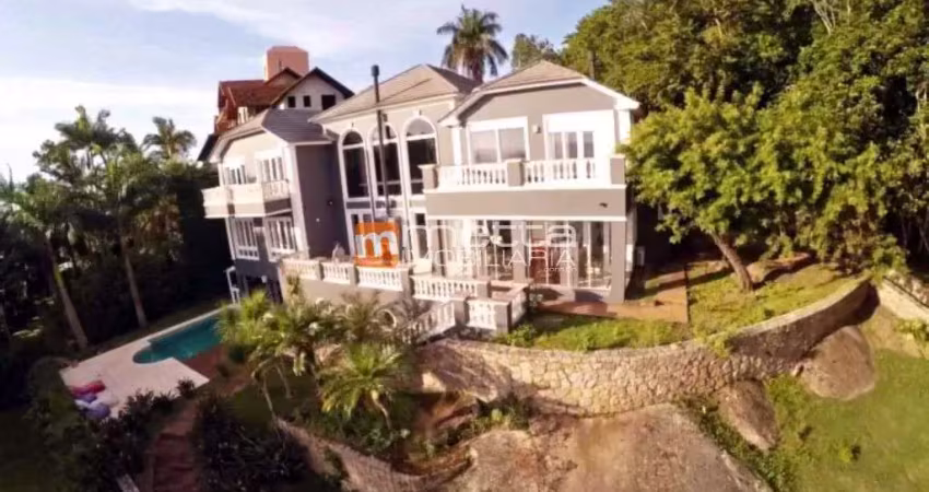 Casa em condomínio fechado com 5 quartos à venda na Rua Bico de Lacre, 203, Cacupé, Florianópolis