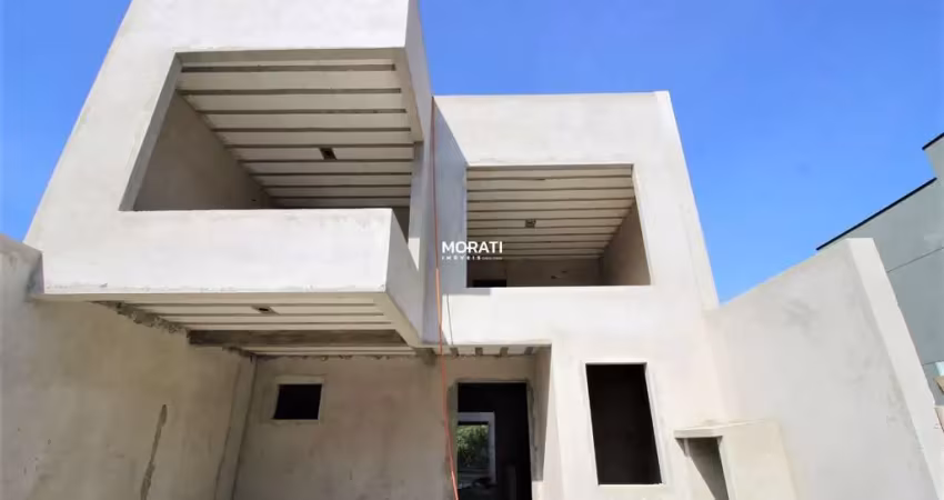 Sobrado com fachada moderna no condomínio foggiatto