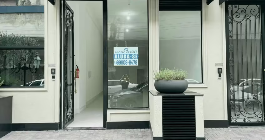 Sala comercial em meia praia itapema com 100m² privativos/pé direito alto