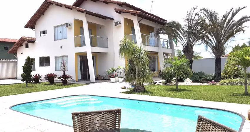 Bela casa com 05 dormitórios e terreno espetacular próximo ao mar em jacaraípe