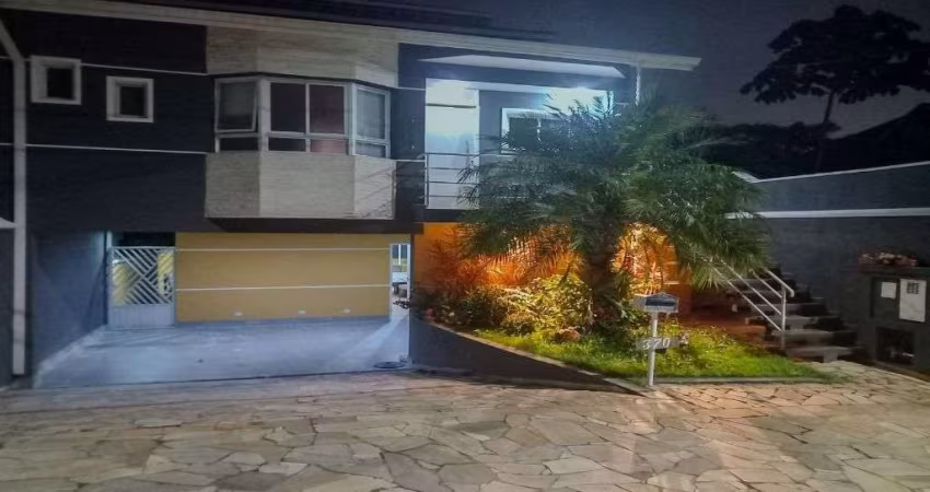 Casa com 3 dormitórios à venda, 286 m² por R$ 1.300.000,00 - Parque Nova Jandira - Jandira/SP