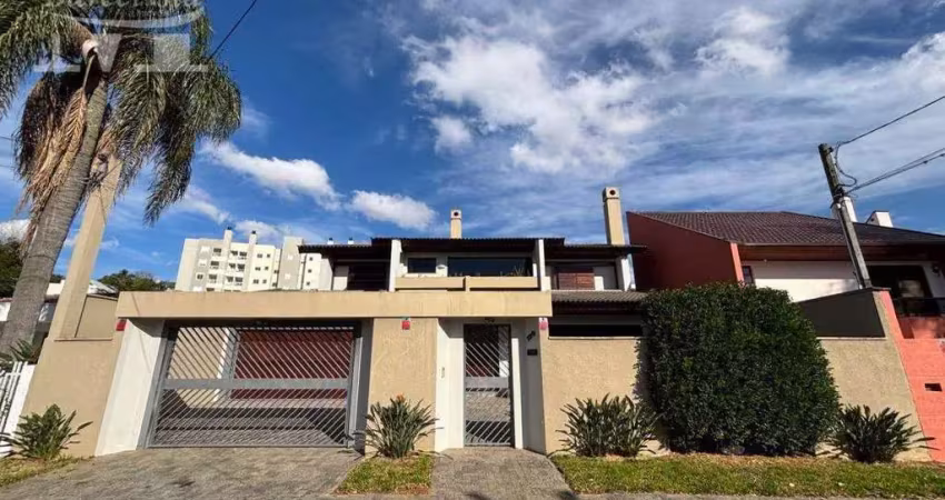 Casa a venda no bairro seminário. amplo jardim. 4 quartos. espaço gourmet. 6 vagas de garagem.