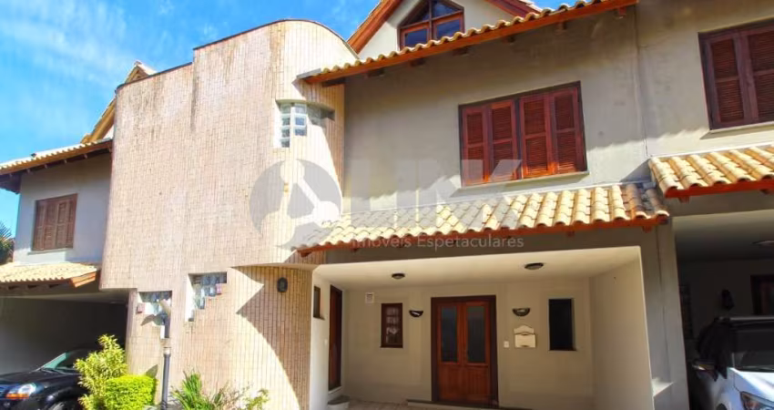 Casa em condomínio 3 dormitórios com 2 vagas de garagem à venda no bairro Cristal em Porto Alegre próximo ao Barra Shopping