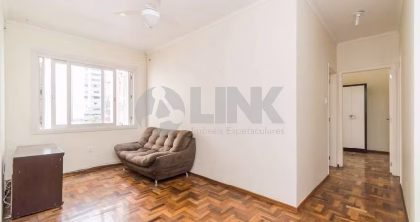 Apartamento de 2 dormitórios à venda no bairro Moinhos de Vento em Porto Alegre próximo ao Parcão