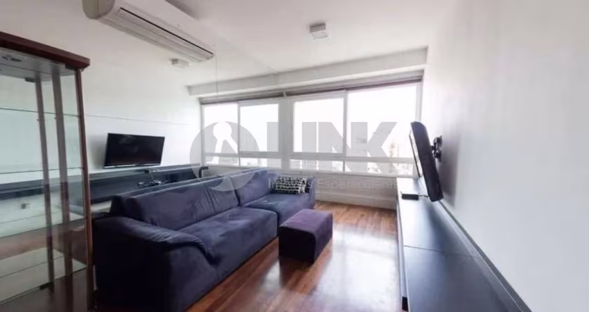Apartamento mobiliado de 1 quarto com 1 vaga à venda no bairro Cidade Baixa em Porto Alegre