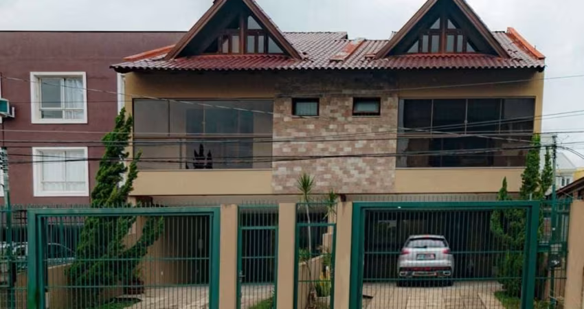 Casa com 3 quartos à venda na Rua Dom Jaime de Barros Câmara, 705, Sarandi, Porto Alegre
