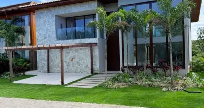 Casa alto padrão à venda no condomínio praia bella, localização privilegiada: lote com frente, fundo e lateral direita para alameda.