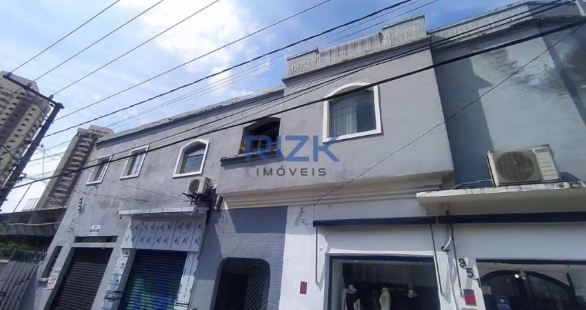 Casa comercial para locação com 4 salas.