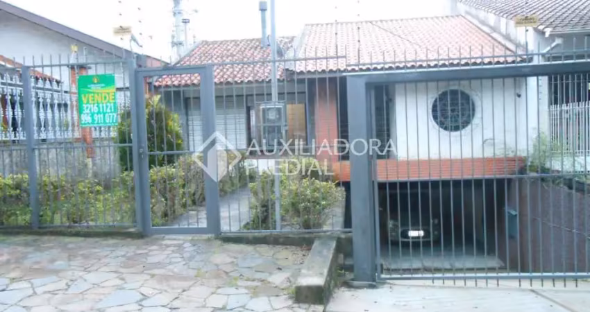 Casa em condomínio fechado com 4 quartos à venda na Rua Tomaz Edison, 127, Santo Antônio, Porto Alegre