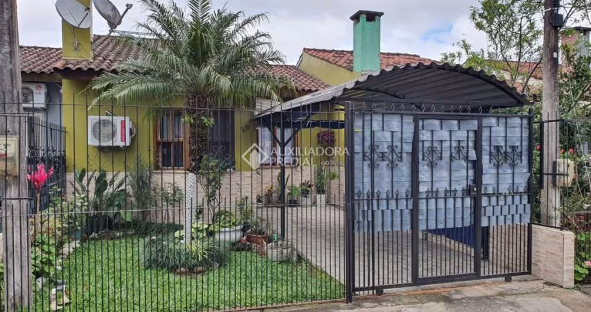 Casa em condomínio fechado com 2 quartos à venda na Rua Capitão Pedroso, 769, Restinga, Porto Alegre