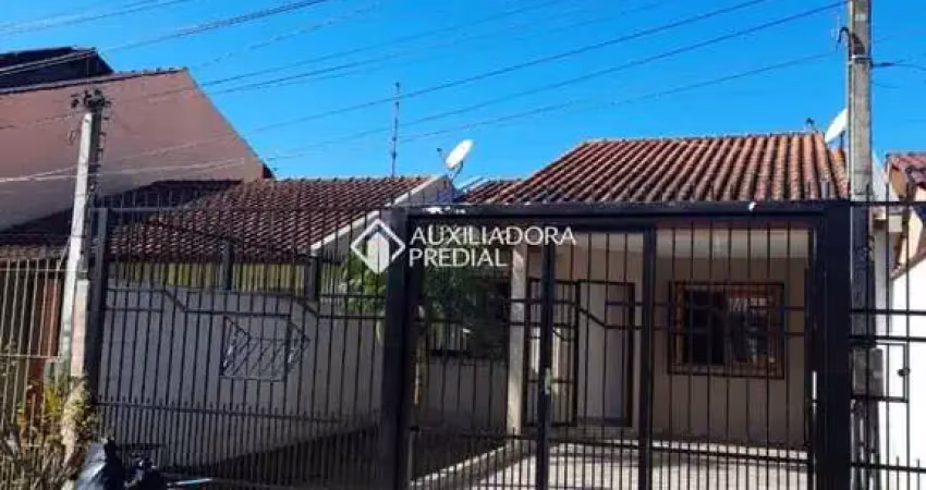Casa com 2 quartos à venda na Rua Biguás, 530, Jardim Algarve, Alvorada
