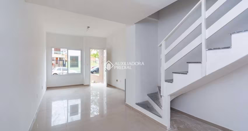 Casa em condomínio fechado com 2 quartos à venda na Rua Luzinete Alves Aragon, 201, Hípica, Porto Alegre