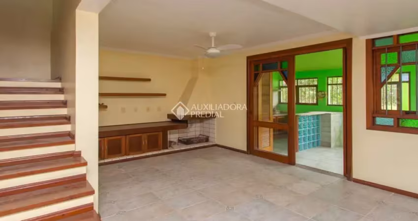 Casa com 3 quartos à venda na Rua Augusto Lourenço Martins, 110, Vila Nova, Porto Alegre