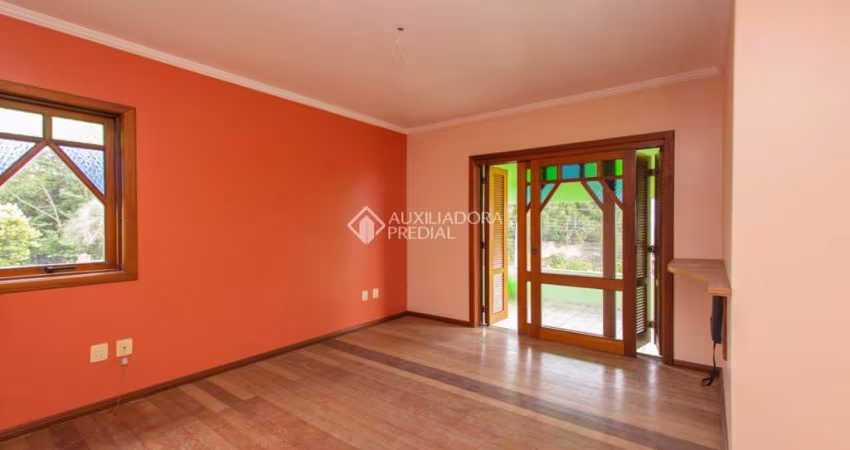 Casa com 3 quartos à venda na Rua Augusto Lourenço Martins, 110, Vila Nova, Porto Alegre