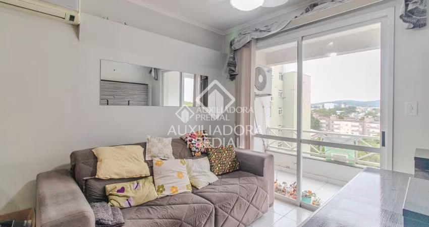 Apartamento com 2 quartos à venda na Rua Xavier da Cunha, 999, Nonoai, Porto Alegre