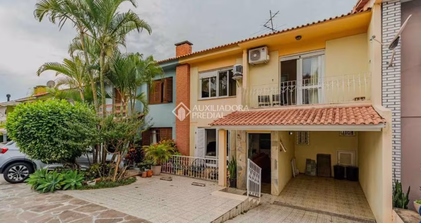 Casa em condomínio fechado com 4 quartos à venda na Rua Martim Afonso, 115, Santo Antônio, Porto Alegre