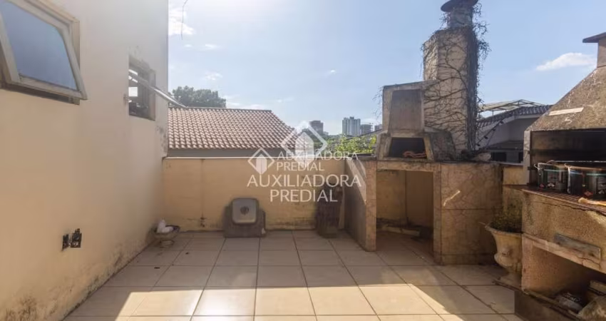 Casa com 3 quartos à venda na Rua Carlos Huber, 1020, Três Figueiras, Porto Alegre