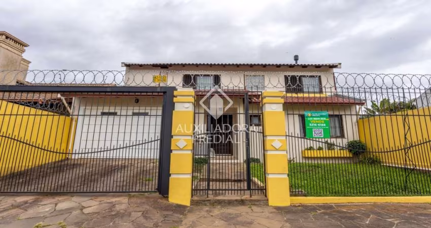 Casa com 4 quartos à venda na Rua das Petúnias, 277, Estância Velha, Canoas