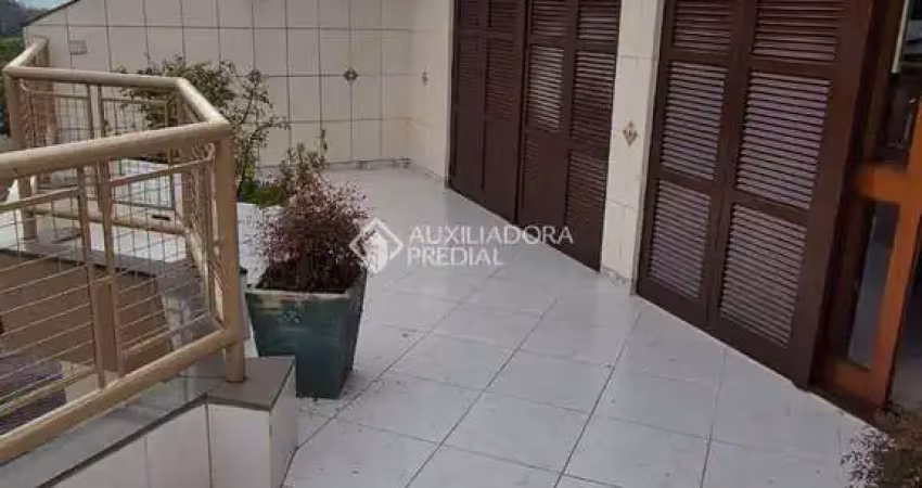 Apartamento com 3 quartos à venda na Rua Joaquim Cruz, 198, Santo Antônio, Porto Alegre