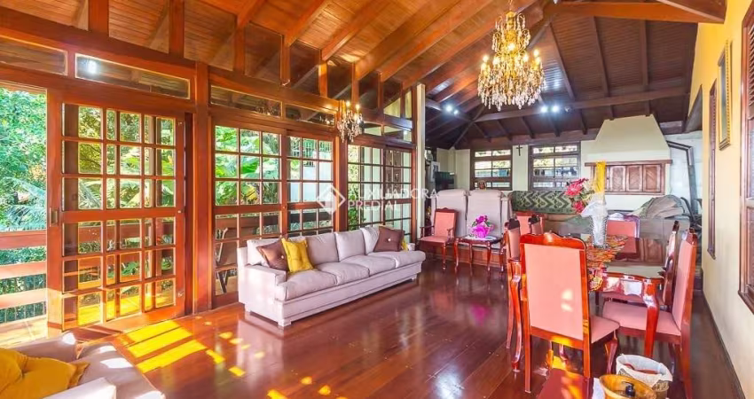 Casa com 4 quartos à venda na Rua Fernando Osório, 1146, Teresópolis, Porto Alegre