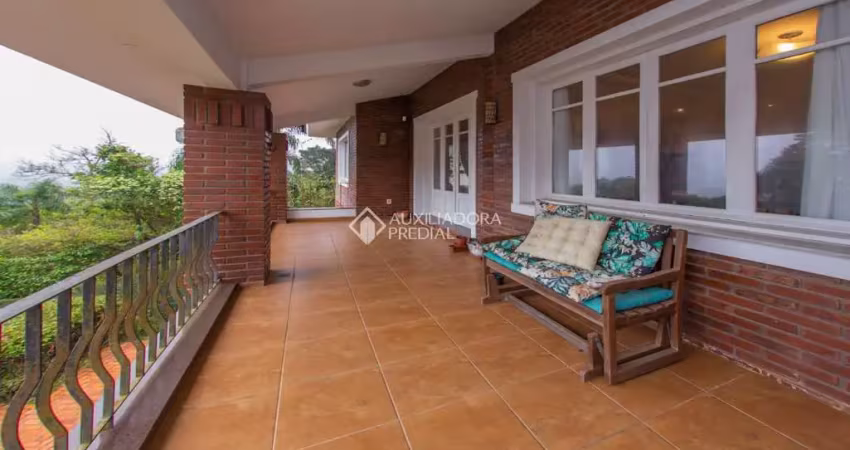 Casa com 4 quartos à venda na Rua Deputado Astério de Mello, 415, Teresópolis, Porto Alegre