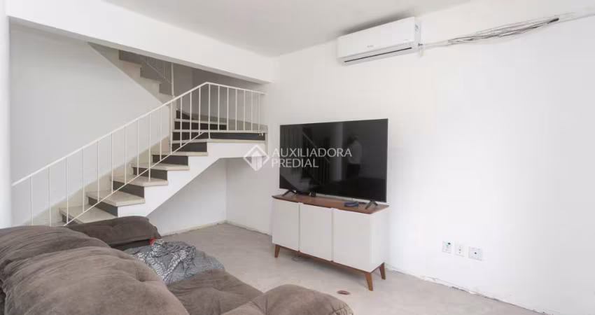 Casa com 4 quartos à venda na Rua Buarque de Macedo, 846, São Geraldo, Porto Alegre