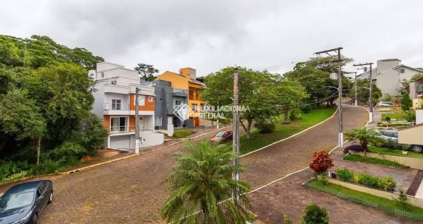 Casa em condomínio fechado com 3 quartos à venda na Rua Adriano Pereira da Silva, 311, Vila Nova, Porto Alegre