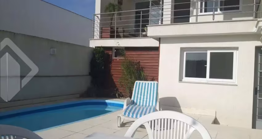 Casa em condomínio fechado com 4 quartos à venda na Rua Adriano Pereira da Silva, 290, Vila Nova, Porto Alegre