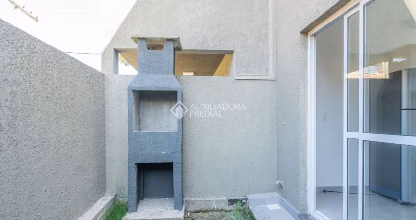 Casa em condomínio fechado com 2 quartos à venda na Rua Miguel Ascoleze, 125, Vila Nova, Porto Alegre