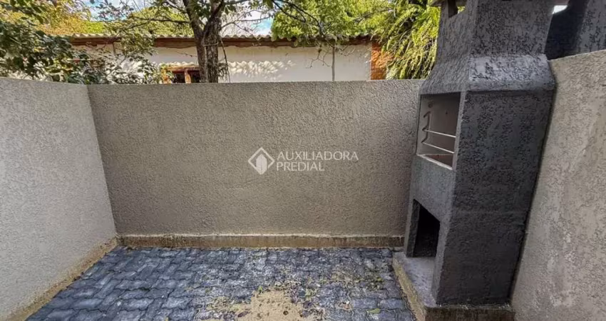 Casa em condomínio fechado com 2 quartos à venda na Rua Miguel Ascoleze, 125, Vila Nova, Porto Alegre