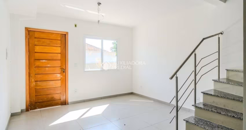 Casa em condomínio fechado com 2 quartos à venda na Rua Miguel Ascoleze, 125, Vila Nova, Porto Alegre