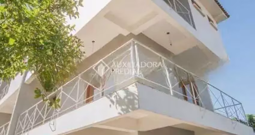 Casa em condomínio fechado com 3 quartos à venda na Rua Jamil Antônio José, 46, Nonoai, Porto Alegre