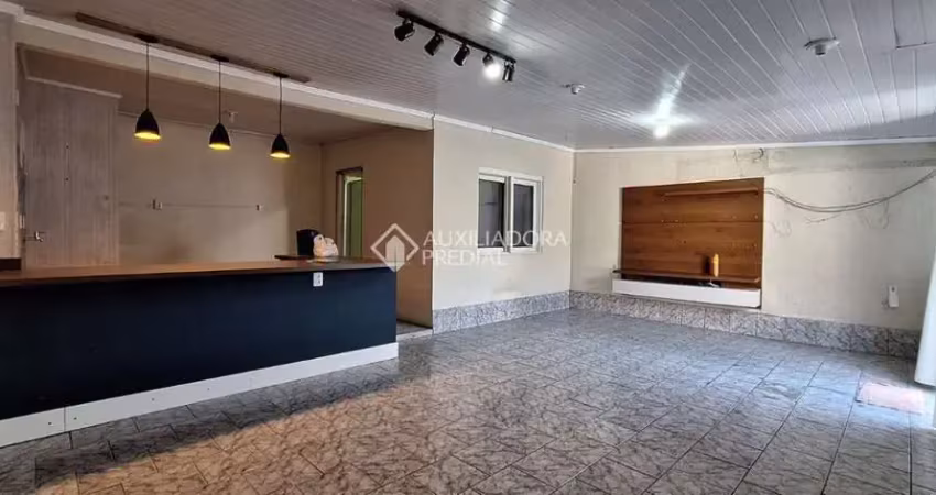 Casa em condomínio fechado com 3 quartos à venda na Hermínio Machado, 103, Jardim Algarve, Alvorada